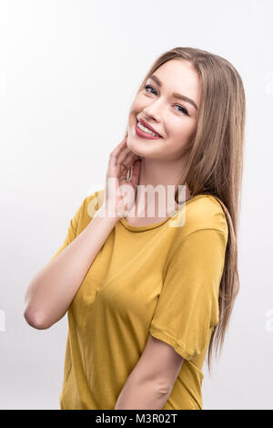 Charming woman with nice makeup posing on white background Stock Photo