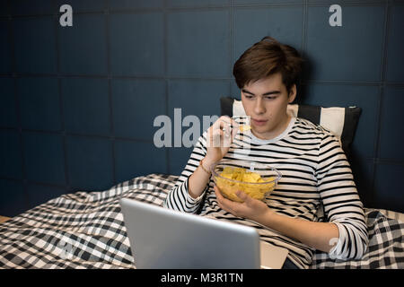 Teenage Boy on Weekend Night Stock Photo