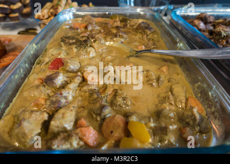 Dish with tasty beef curry on dark background, closeup Stock Photo - Alamy