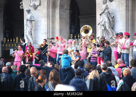 Street brass band performing in front of Palais Garnier (Opera House) in Paris, France Stock Photo