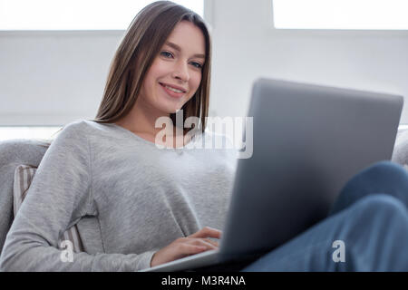 Content freelancer enjoying working from home Stock Photo