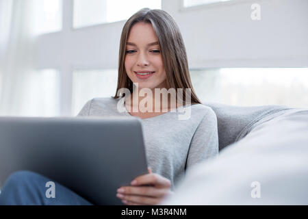Inspired freelancer enjoying working from home Stock Photo