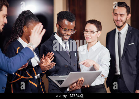 smart business partners using laptop at meeting Stock Photo