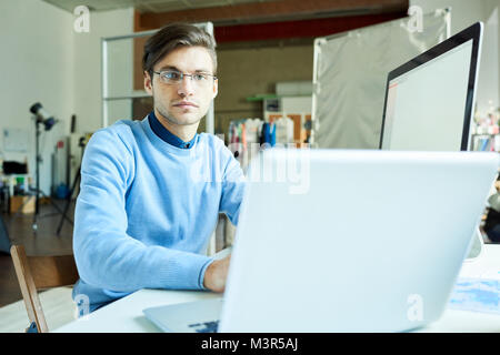 IT Professional Coding at Workplace Stock Photo