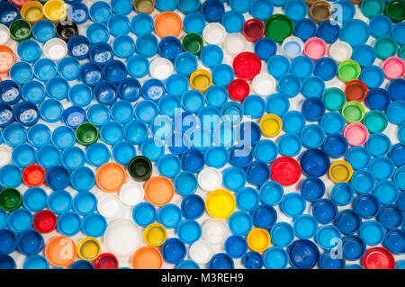 Different color plastic caps from bottles Stock Photo