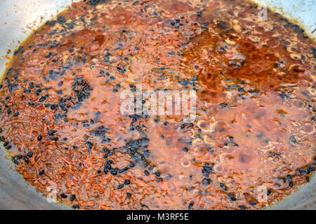 Bowl with spices for cooking pilaf Stock Photo