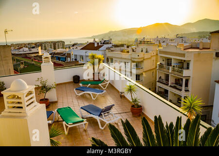 Rooftop terrace relax in Spanish white city with coastline Stock Photo