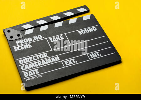 movie clapper on yellow background, cinema concept Stock Photo