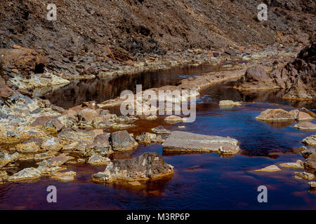 Fantastic colours of Rio Tinto. The river is famous for its deep red colour due to high concentration of iron salts and sulphates in water. Province H Stock Photo