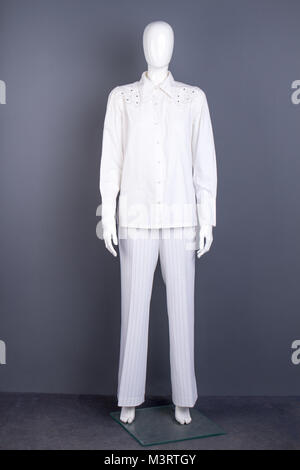 Full length mannequin in white apparel. Stock Photo