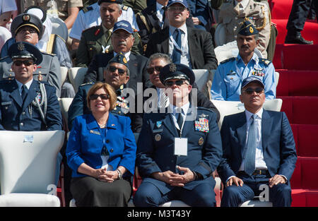 Mrs. Heidi Grant (center left), the Deputy Under Secretary of the Air Force of International Affairs, and U.S. Air Force General Frank Gorenc (center right), Commander of U.S. Air Force in Europe – Air Forces Africa, watch an aircraft fly over during the opening day ceremony of the International Marrakech Airshow in Morocco on Apr. 27, 2016. Several U.S. independent and government owned aircraft were displayed at the expo in an effort to demonstrate their capabilities to a broad audience of individuals from approximately 54 other countries. (DoD News photo by TSgt Brian Kimball) 160427-F-QP401 Stock Photo