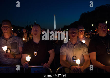 During This Year's Police Week Candlelight Vigil in Washington D.C. the U.S. Marshals Service honored two of our fallen deputies and hosted their families. In 2015 we lost both Josie Wells and Zacarias Toro. In 1962, President Kennedy proclaimed May 15 as National Peace Officers Memorial Day and the calendar week in which May 15 falls, as National Police Week. Established by a joint resolution of Congress in 1962, National Police Week pays special recognition to those law enforcement officers who have lost their lives in the line of duty for the safety and protection of others. Photo By: Shane Stock Photo