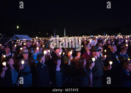 During This Year's Police Week Candlelight Vigil in Washington D.C. the U.S. Marshals Service honored two of our fallen deputies and hosted their families. In 2015 we lost both Josie Wells and Zacarias Toro. In 1962, President Kennedy proclaimed May 15 as National Peace Officers Memorial Day and the calendar week in which May 15 falls, as National Police Week. Established by a joint resolution of Congress in 1962, National Police Week pays special recognition to those law enforcement officers who have lost their lives in the line of duty for the safety and protection of others. Photo By: Shane Stock Photo