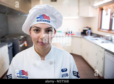 Airman 1st Class Alexandra Ayub, is a missile chef for the 90th Force Support Squadron based at Francis E. Warren Air Force Base, Wyoming, but is regularly deployed to prepare meals at outside MAFs. During the four-day deployments, Ayub provides meals to the Airmen stationed at the MAF and the missileers manning the launch control centers located beneath the MAF. (U.S. Air Force photo/Staff Sgt. Andrew Lee) 160515-F-NL936-378 by AirmanMagazine Stock Photo