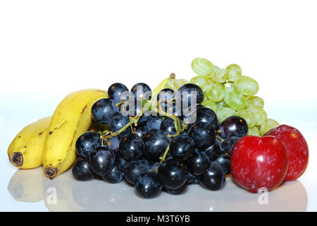 many fresh healthy range of fruits, apple banana grapes Stock Photo
