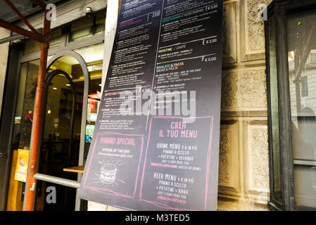 Rome, ITALY - November 8 2017: Menu and prices on a billboard on the streets of Rome. Local cuisine. ROME, November 8 2017 Stock Photo