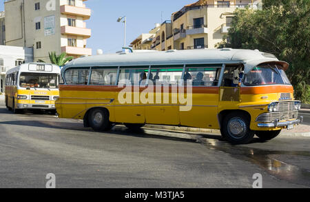 MALTA-SEPTEMBER 7 :Classic vintage buses on the streets of Bugibba ,Malta, on September 7,2007. Stock Photo
