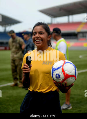PANAMA CITY, Panama (Sept. 20, 2016) - Logistics Specialist Seaman Raina Ramirez, a Sailor assigned to USNS Spearhead (T-EPF-1), thanks the UNITAS partner nations participating in a day of sports at the Estadio Maracaná de Panamá soccer stadium. UNITAS is an annual multi-national exercise that focuses on strengthening our existing regional partnerships and encourages establishing new relationships through the exchange of maritime mission-focused knowledge and expertise throughout the exercise. (U.S. Navy Photo by Mass Communication Specialist 1st Class Jacob Sippel/RELEASED) 160920-N-AW702-009 Stock Photo