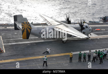 PACIFIC OCEAN – (OCT. 16, 2016) A C-2A Greyhound from the “Providers” of Fleet Logistics Squadron (VRC) 30, prepares to take off from the flight deck of the aircraft carrier USS Nimitz (CVN 68). Nimitz is underway to complete flight deck certification and carrier qualifications for an upcoming 2017 deployment. (U.S. Navy photo by Seaman David Claypool/Released) 161016-N-XU691-001 by USS NIMITZ (CVN 68) Stock Photo