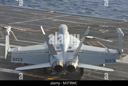 161016-N-XU691-086 PACIFIC OCEAN – (Oct. 16, 2016) An EA-18G Growler from the Gray Wolves of Electronic Attack Squadron (VAQ) 142 prepares to take off from the flight deck of the aircraft carrier USS Nimitz (CVN 68).  Nimitz is underway to complete flight deck certification and carrier qualifications for an upcoming 2017 deployment. (U.S. Navy photo by Seaman David Claypool/Released) 161016-N-XU691-086 by USS NIMITZ (CVN 68) Stock Photo