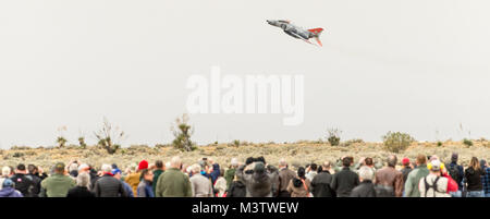 Pilots of 82nd Aerial Target Squadron Detachment 1 led the final military flight of the storied F-4 Phantom II at Holloman AFB, N.M., Dec. 21, 2016. The F-4 Phantom II entered the U.S. Air Force inventory in 1963 and was the primary multi-role aircraft in the USAF throughout the 1960s and 1970s. The F-4 flew bombing, combat air patrol, fighter escort, reconnaissance and the famous Wild Weasel anti-aircraft missile suppression missions. The final variant of the Phantom II was the QF-4 unmanned aerial targets flown by the 82nd at Holloman AFB. (U.S. Air Force photo by J.M. Eddins Jr.) 161221-F-L Stock Photo