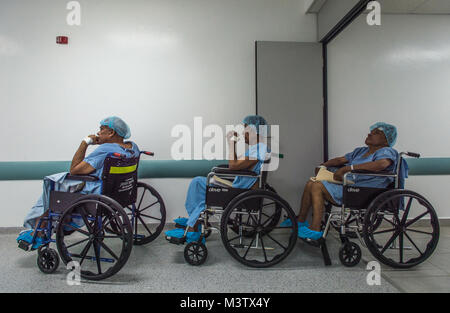 Patients wait for their eye surgeries at the Centro Hospitalario Luis 'Chicho' Fabrega, Santiago, Panama, Feb. 6, 2017, during a medical readiness training exercise. A U.S. military medical team was in Panama to help treat individuals with cataracts that otherwise would have gone untreated. Medical readiness training exercises provide U.S. military personnel training in delivery of medical care in austere conditions, promote diplomatic relations between the U.S. and host nations in Central America and provide humanitarian and civic assistance via a long-term proactive program. These exercises  Stock Photo