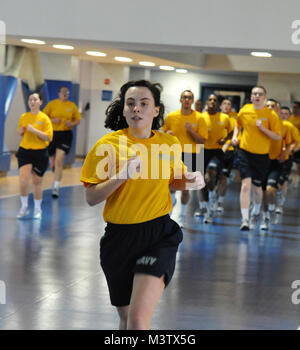 170206-N-SL853-138  GREAT LAKES, Ill. (Feb. 6, 2017) A U.S. Navy Recruit participates in a 12-minute sustained run at Freedom Hall fitness center onboard Recruit Training Command (RTC). Recruits participate in physical training six days a week while stationed at RTC. About 30,000-40,000 recruits graduate annually from the Navy's only boot camp. (U.S. Navy photo by Chief Petty Officer Seth Schaeffer/Released) 170206-N-SL853-138 by Photograph Curator Stock Photo