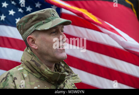 GRAFENWOEHR, Germany – U.S. Army Brigadier General Steven Ainsworth, Deputy Commanding General of the 21st Theater Sustainment Command, speaks to German press after signing the first ever unit memorandum of partnership with Major General Ulrich Baumgartner, Commanding General of the Bundeswehr Operational Medical Support Command, during a U.S. Army Europe Expert Field Medical Badge evaluation in Grafenwoehr, Germany on March 24, 2017. Approximately 215 candidates from the U.S. Army and ten European partner nations attended this biannual evaluation in hopes of achieving the coveted U.S. Army EF Stock Photo