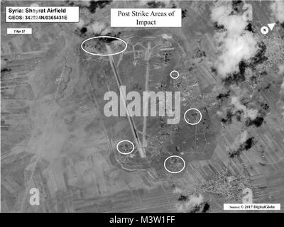 170407-N-XX999-001 WASHINGTON (April 7, 2017) Battle damage assessment image of Shayrat Airfield, Syria, following U.S. Tomahawk Land Attack Missile strikes April 7, 2017 from the USS Ross (DDG 71) and USS Porter (DDG 78), Arleigh Burke-class guided-missile destroyers. The United States fired Tomahawk missiles into Syria in retaliation for the regime of Bashar Assad using nerve agents to attack his own people. (U.S. Navy photo/Released) 170407-N-XX999-001 by Photograph Curator Stock Photo