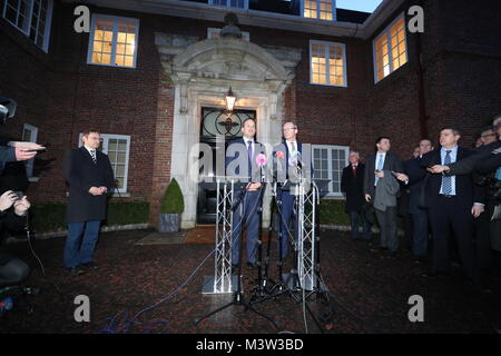 Taoiseach Leo Varadkar (left) and Irish Foreign Minister Simon Coveney speaking outside Stormont House in Belfast, following a bilateral meeting with Prime Minister Theresa May, after they held crunch talks at Stormont with the region's political leaders in a bid to encourage Sinn Fein and the Democratic Unionists (DUP) to resolve their differences, amid growing speculation that a deal to restore powersharing is edging closer. Stock Photo