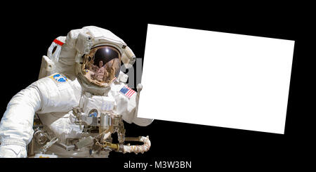 Astronaut in space holding a white blank board - elements of this image are provided by NASA Stock Photo