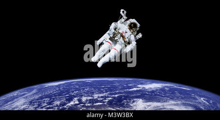 Astronaut in outer space over the planet earth. Elements of this image furnished by NASA Stock Photo