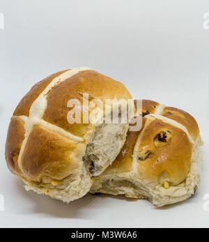Two delecious hot cross buns home made although slightly squashed but ready for Easter Stock Photo