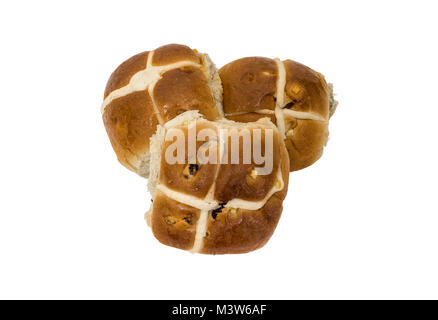 Three newly baked hotcross buns positioned in the shape of a heart on a white background. Stock Photo
