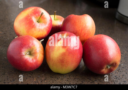 Jazz apples are crisp and juicy eating apples in an English winter Stock Photo