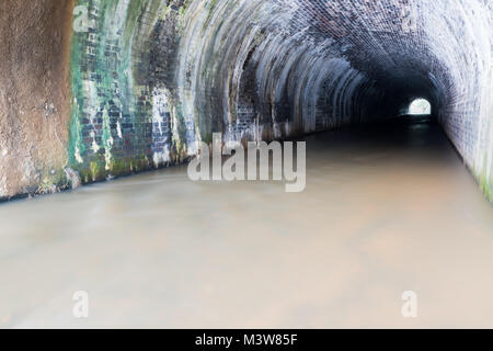 Stream flowing through Tunnel in Cheshire, UK Stock Photo