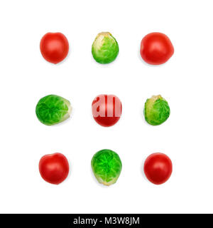 Cherry tomatoes Five juicy cherry tomatoes and four brussels sprouts are lying in a rows on white background Top view photo mockup minimalist style Stock Photo