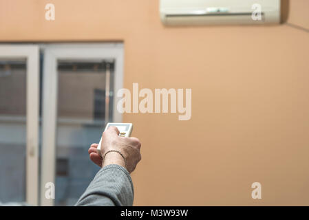 Turn on the air condition Stock Photo
