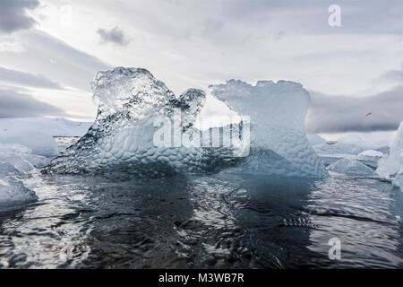 Sculpted sea ice floating in Half Moon Island; Antarctica Stock Photo