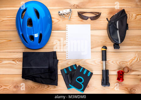 objects for cycling on wooden boards top view Stock Photo