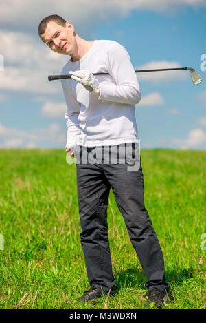 happy golfer portrait in full length on the field Stock Photo