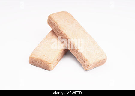 two shortbread finger biscuits or cookies on white background Stock Photo