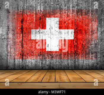 Switzerland flag painted on concrete with wooden floor Stock Photo