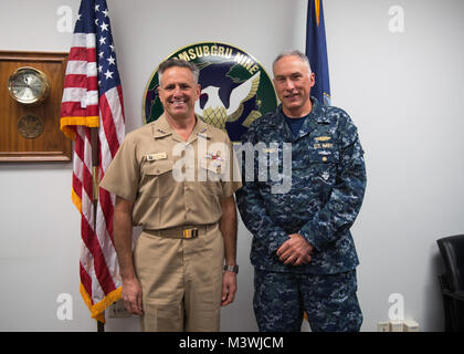 BANGOR, Wash. (June 22, 2017) Chief of Naval Personnel Vice Adm. Robert Burke meets with Rear Adm. John Tammen, commander, Submarine Group 9, while visiting Naval Base Kitsap (NBK) Bangor. During his visit, he conducted four separate all hands calls at NBK Bangor and NBK Bremerton to answer Sailor’s questions. (U.S. Navy photo by Mass Communication Specialist 1st Class Amanda R. Gray/Released) 170622-N-UD469-014 by Naval Base Kitsap (NBK) Stock Photo