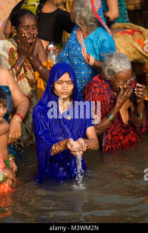 family washing in the River Ganges in Varanasi in India Stock Photo - Alamy