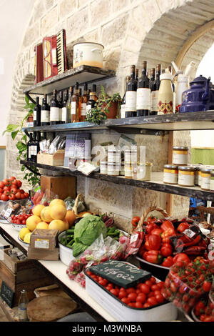 The shelves of a cafe farmers market in Jerusalem are full and overflowing. Stock Photo