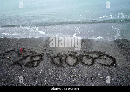 Goodbye message written in the shingle on the beach. Stock Photo