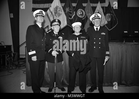 171111-N-OT701-0104 SILVERDALE, Wash.  Rear Adm. Mike Wettlaufer, commander of Carrier Strike Group (CSG) 3 (left), Poses with WWII veterans (retired) Army Lt. Col. Vernon Frykholm, Petty Officer 2nd Class John Glomstad, (retired) Commander Robert Glenn Brown at Kitsap Fairgrounds Pavilion during the Navy League Veteran's Day Ceremony.  Service members from commands across the Puget Sound volunteer and participate in various community events celebrating Veteran’s Day. (U.S. Navy photo by Mass Communication Specialist Seaman Gregory Hall) 171111-N-OT701-0104 by Naval Base Kitsap (NBK) Stock Photo
