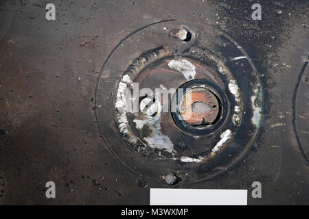 One of nine valves found on Iranian Qiam class short range ballistic missile remnants provides evidence of its origin while on display at Joint Base Anacostia-Boling in Washington, D.C. Dec. 12, 2017. Missile remnants from two missiles fired into Saudi Arabia from Yemen’s Houthi rebels in 2017, are now part of a multi-national collection of evidence proving Iranian weapons proliferation in violation of United Nations resolutions 2216 and 2231. (DoD photo by EJ Hersom) 171212-D-DB155-013 by DoD News Photos Stock Photo