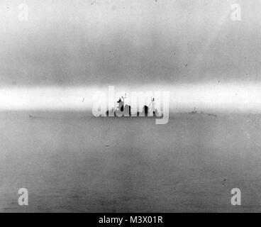 80-G-419148:   USS Missouri (BB-63), April 13, 1969.   Photographed in heavy fog from the flight deck of USS Kearsarge (CV-33).   Photographed by AA Wolfe.   Official U.S. Navy Photograph, now in the collections of the National Archives.  (2018/01/24). 80-G-419148 39846830472 o